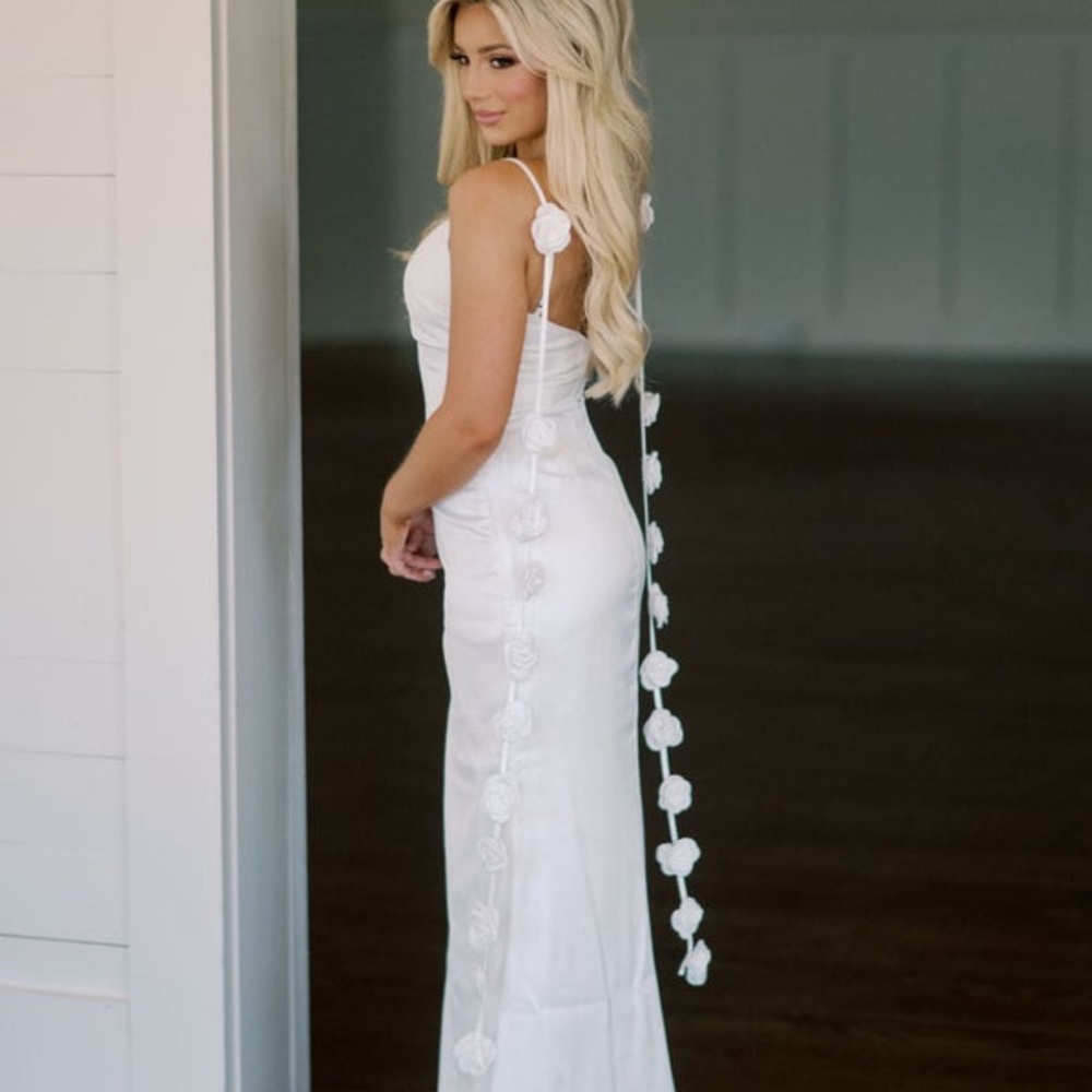 Elegant White Gown with Floral Accents